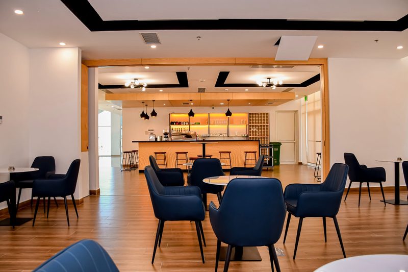 Café seating looking towards the coffee bar